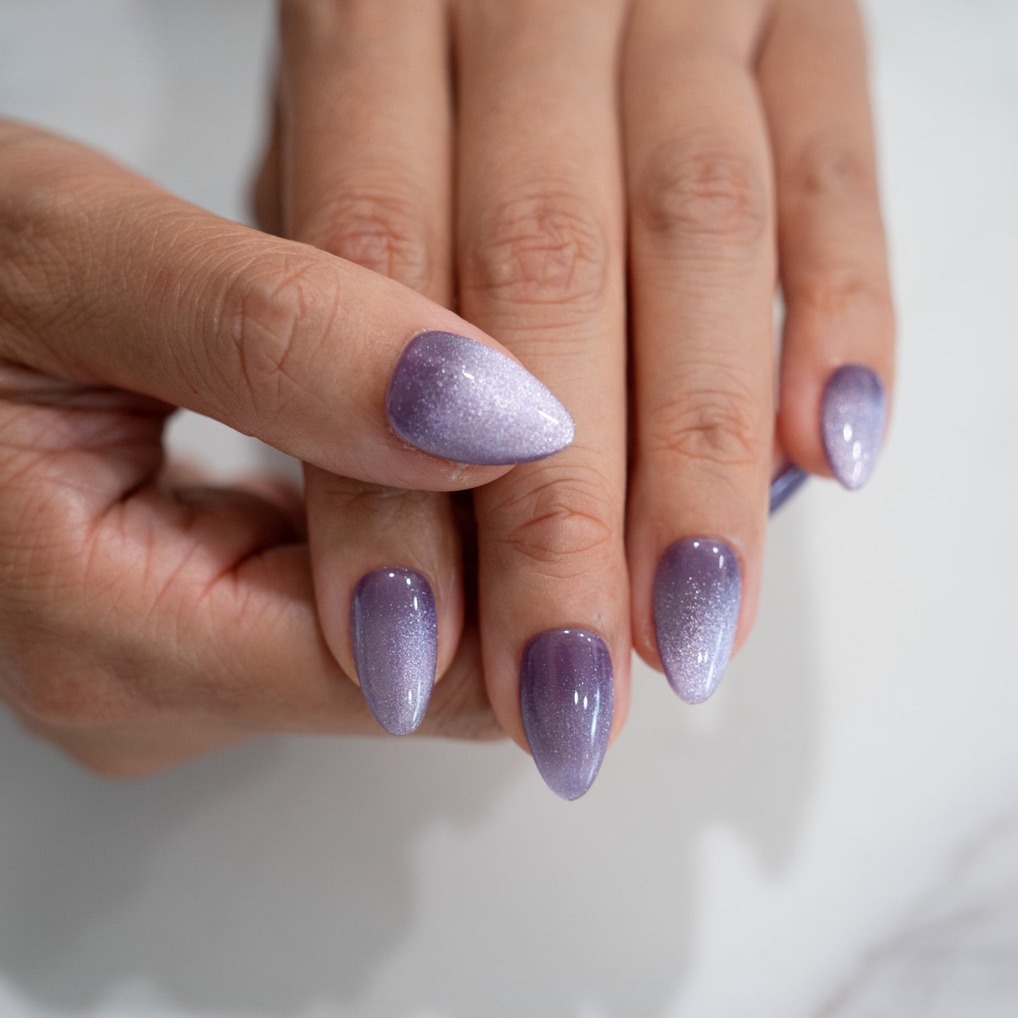 Purple-cat-eye-press-on-nails-bout-dart-model-5