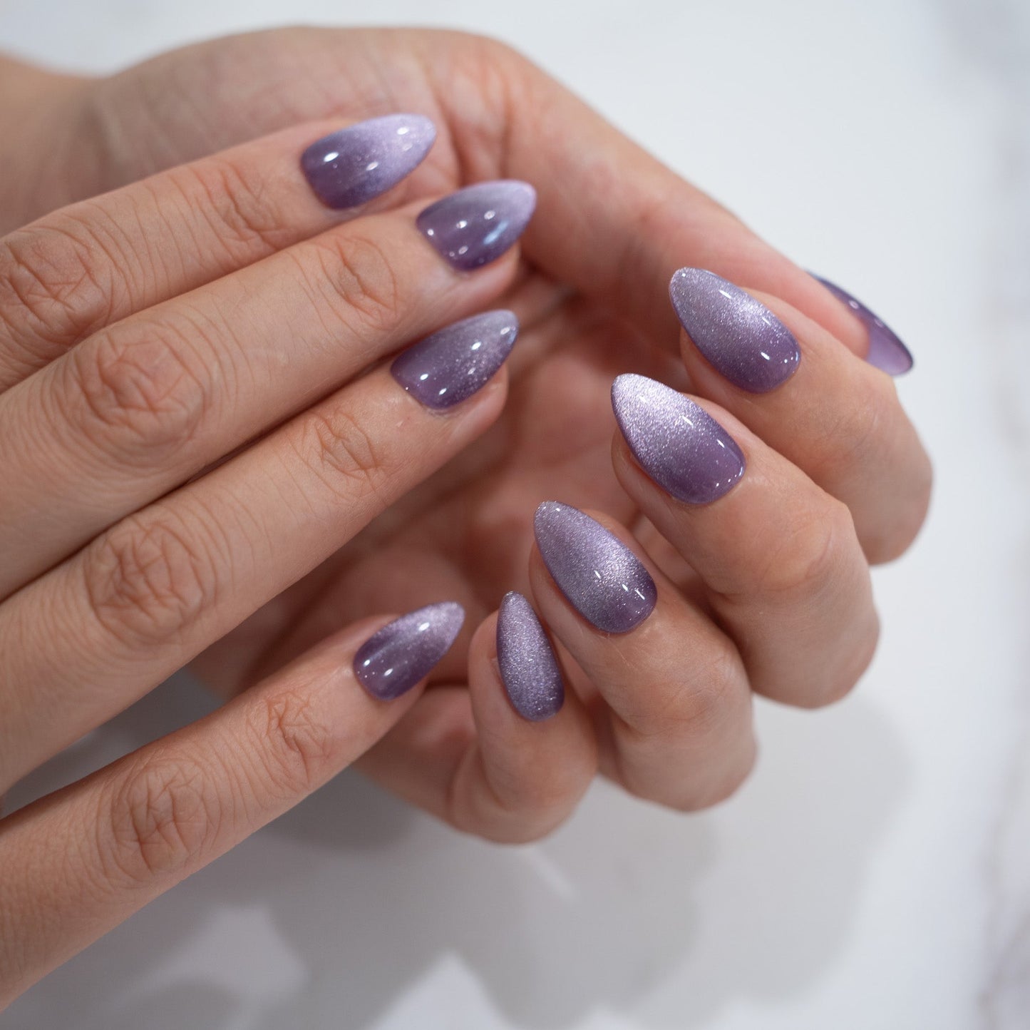 Purple-cat-eye-press-on-nails-bout-dart-model-7
